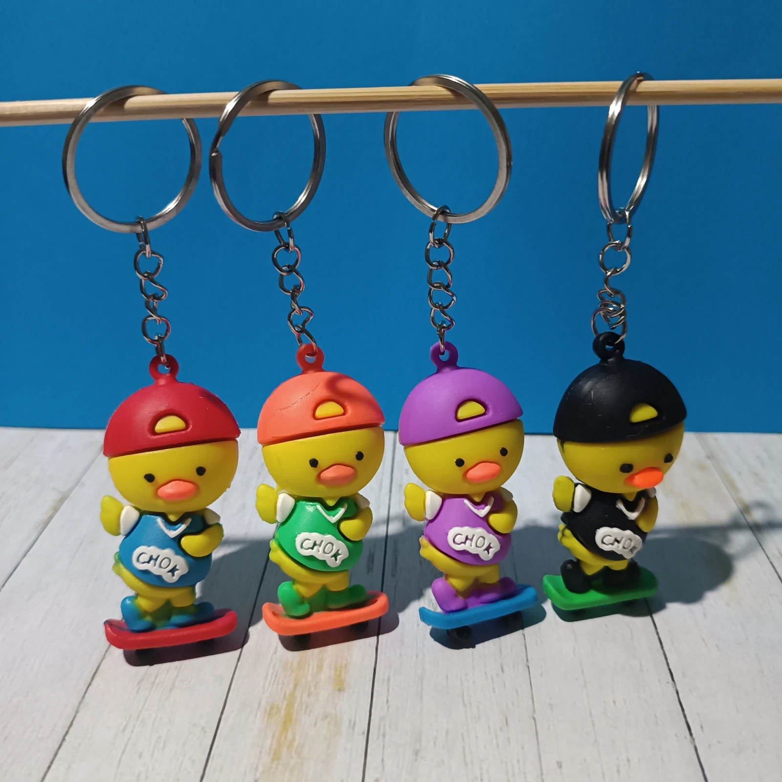 LLAVERO PATO PATINETA