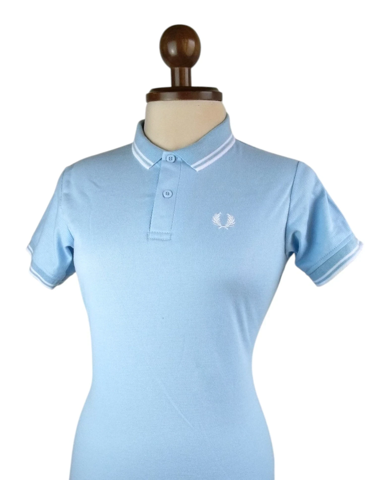 Camisa polo azul claro 