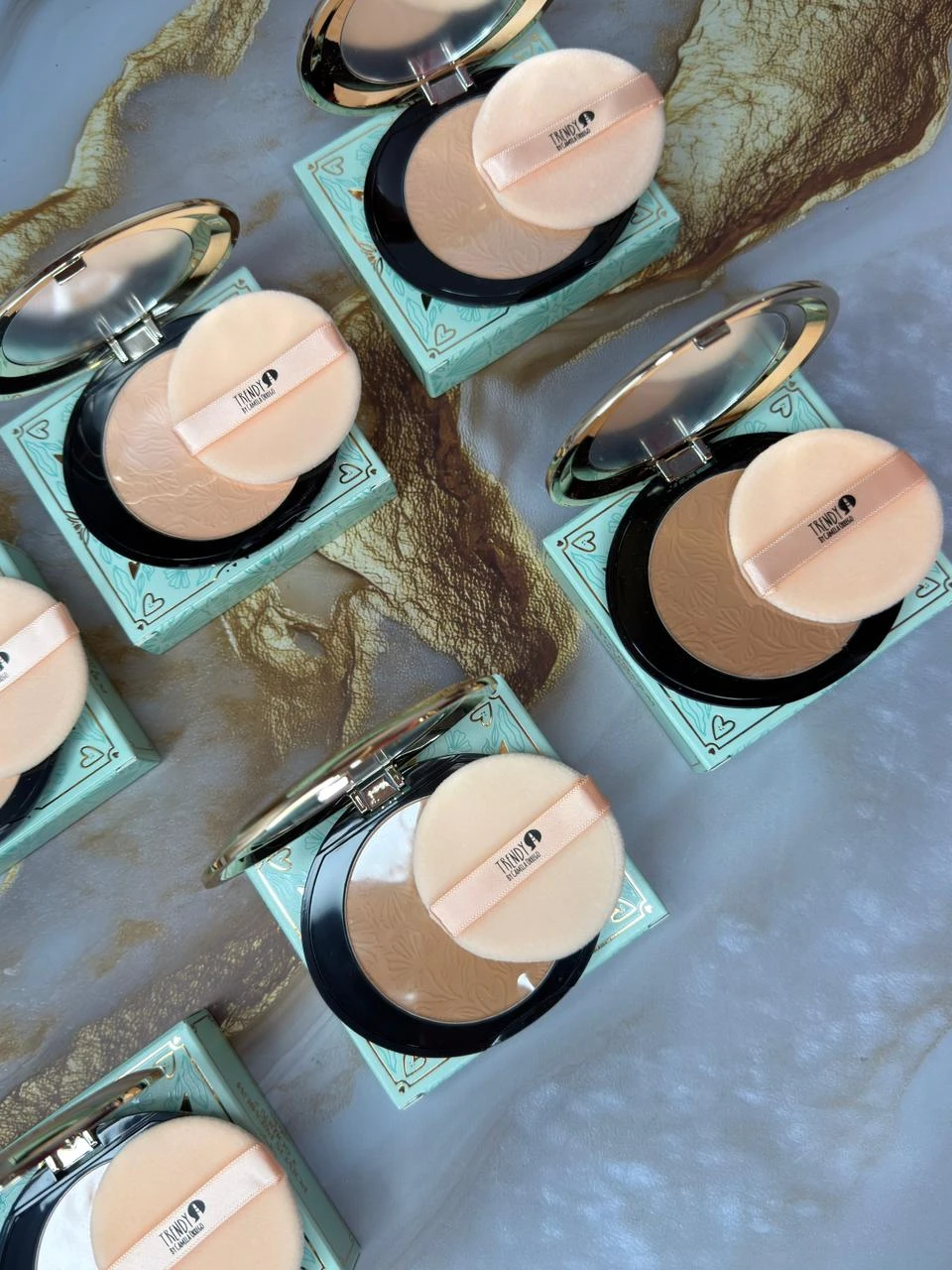 Polvo compacto golden Trendy 4