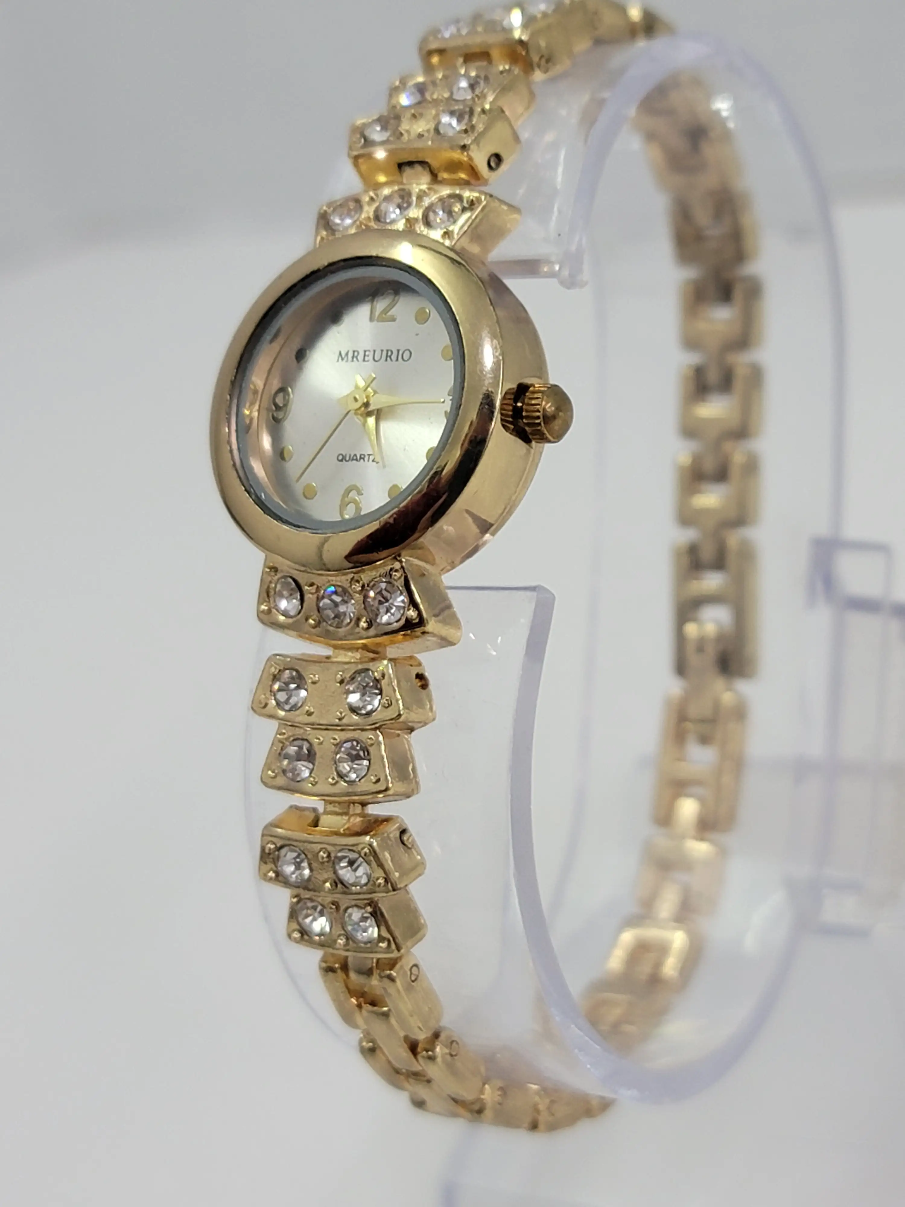 Reloj acerado dorado 3