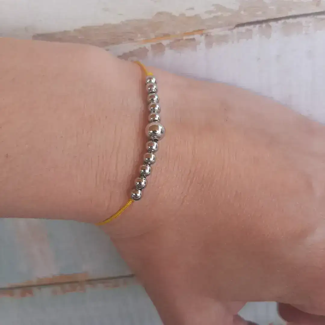 Pulsera hilo amarillo 