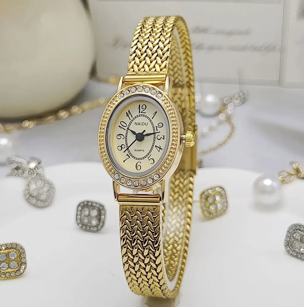 Reloj Naidu Original Acero Análogo Ovalado Dorado Fondo Dorado