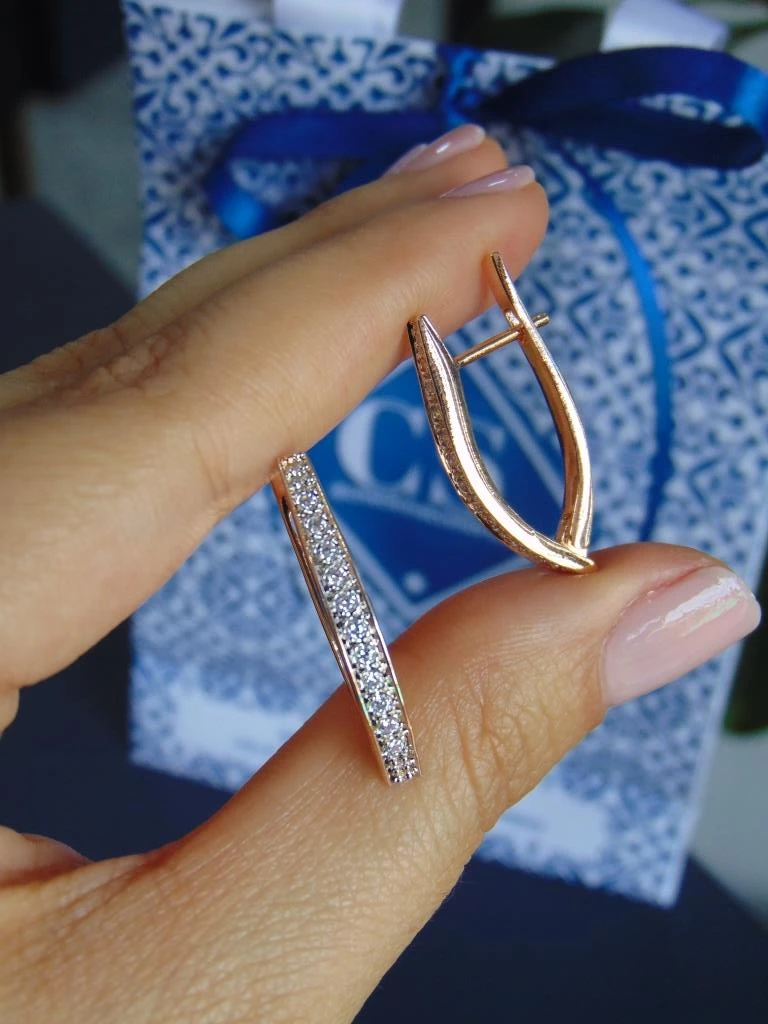 CANDONGA RODIO DOR ROSA LINEA PINZA CIRCON PLATEADO