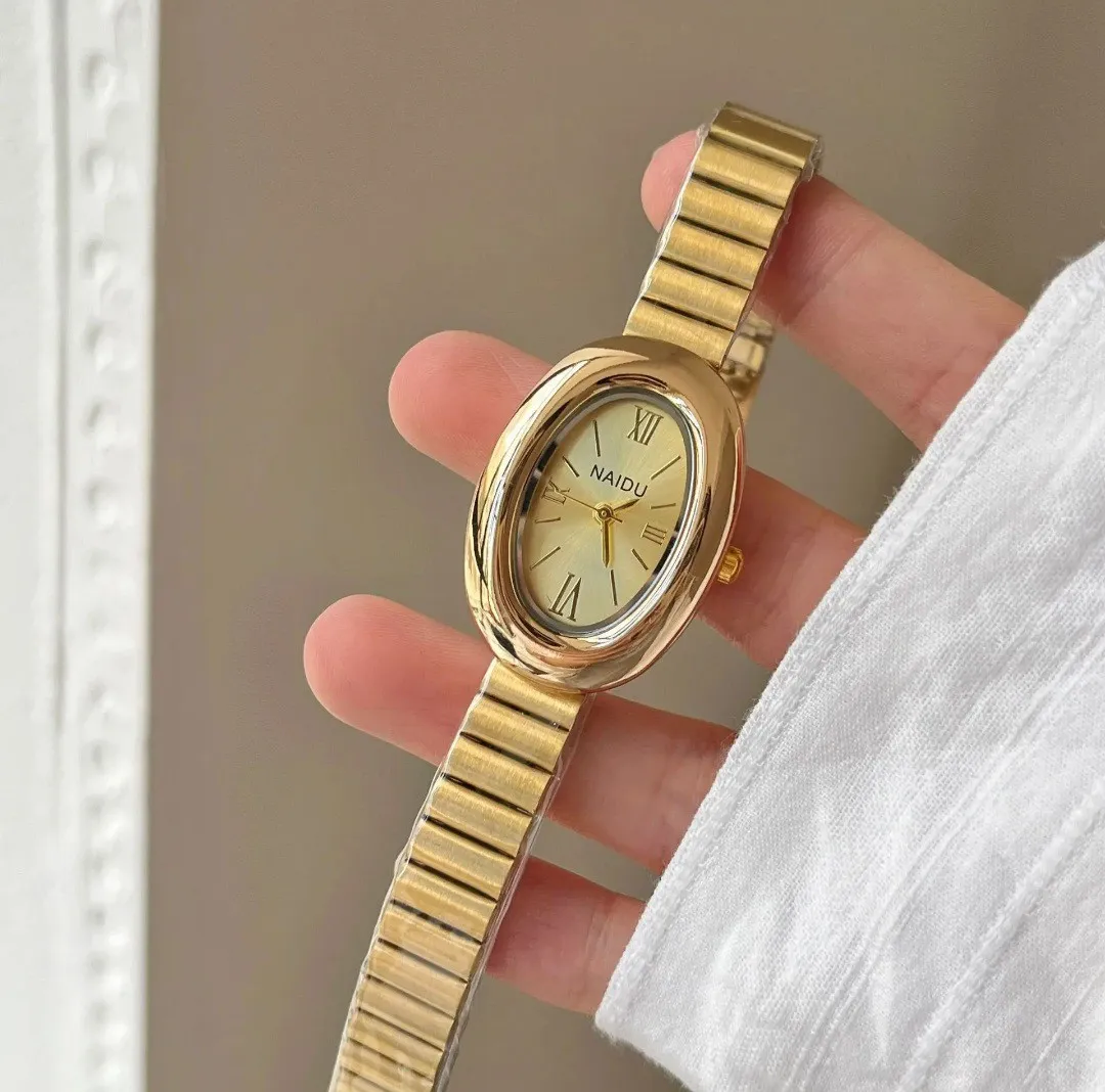 Reloj Naidu Original Acero Análogo Ovalado Dorado Fondo Dorado 2
