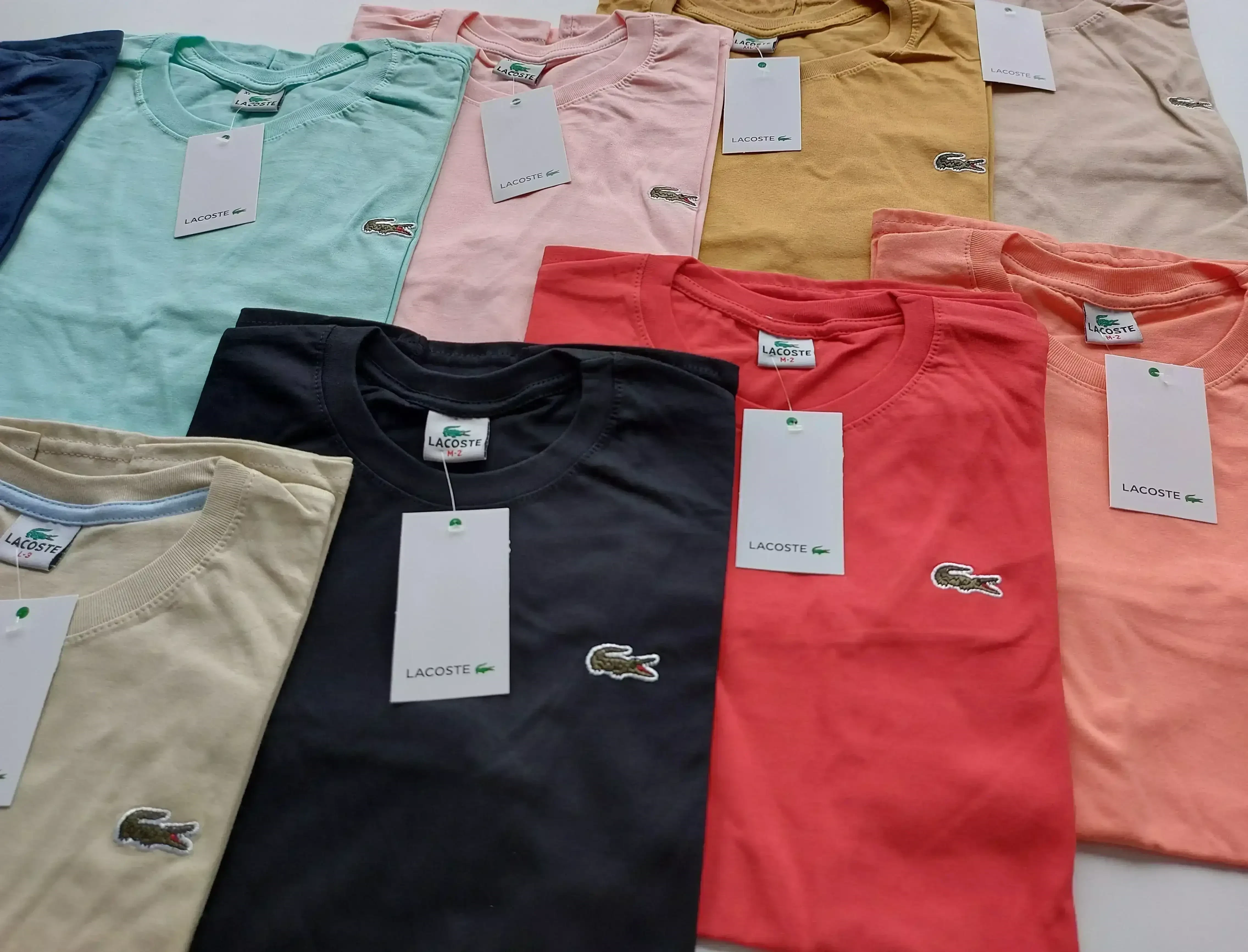 REMERAS LACOSTE Y PENGUIN  7