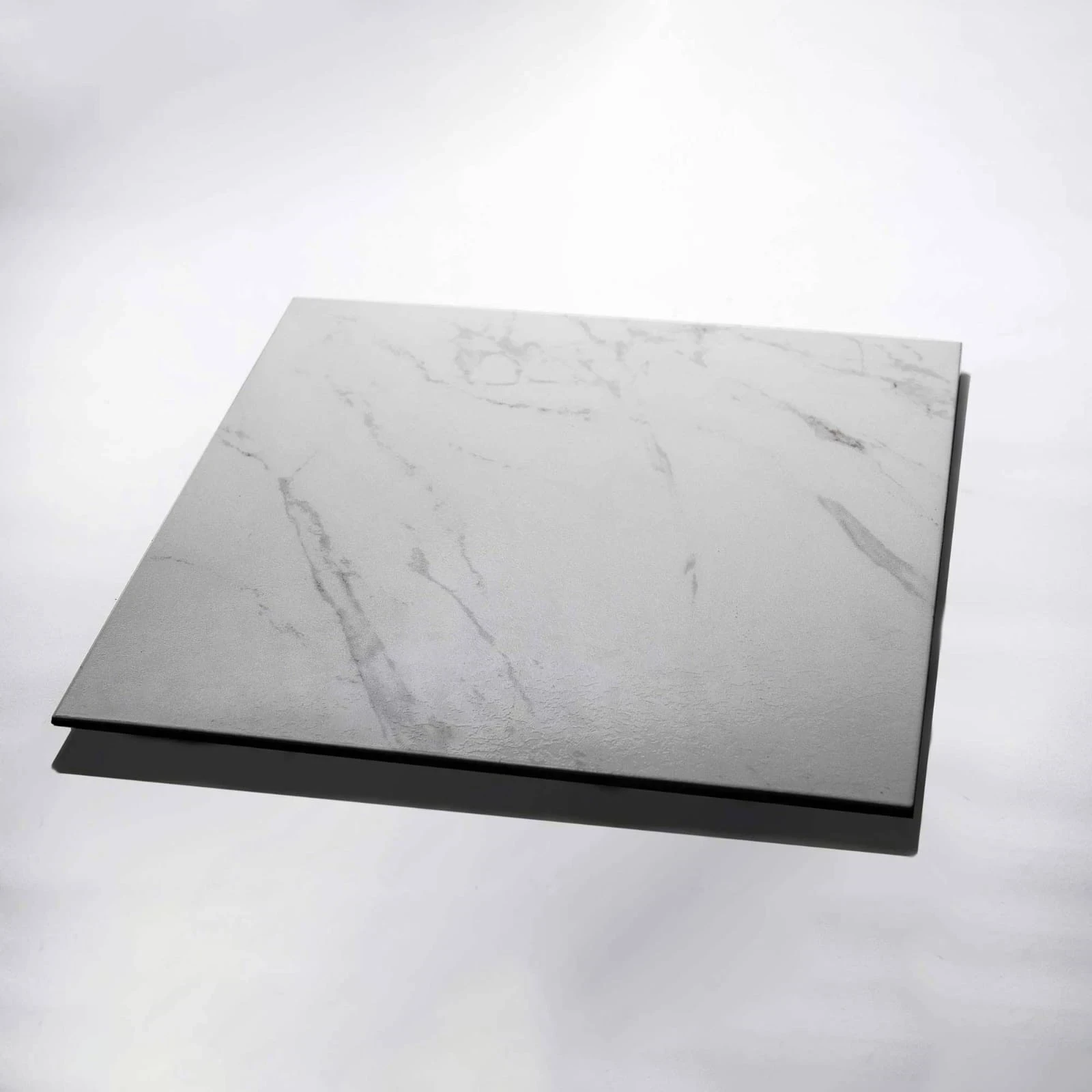 Carrara brillante $10500 mt2 