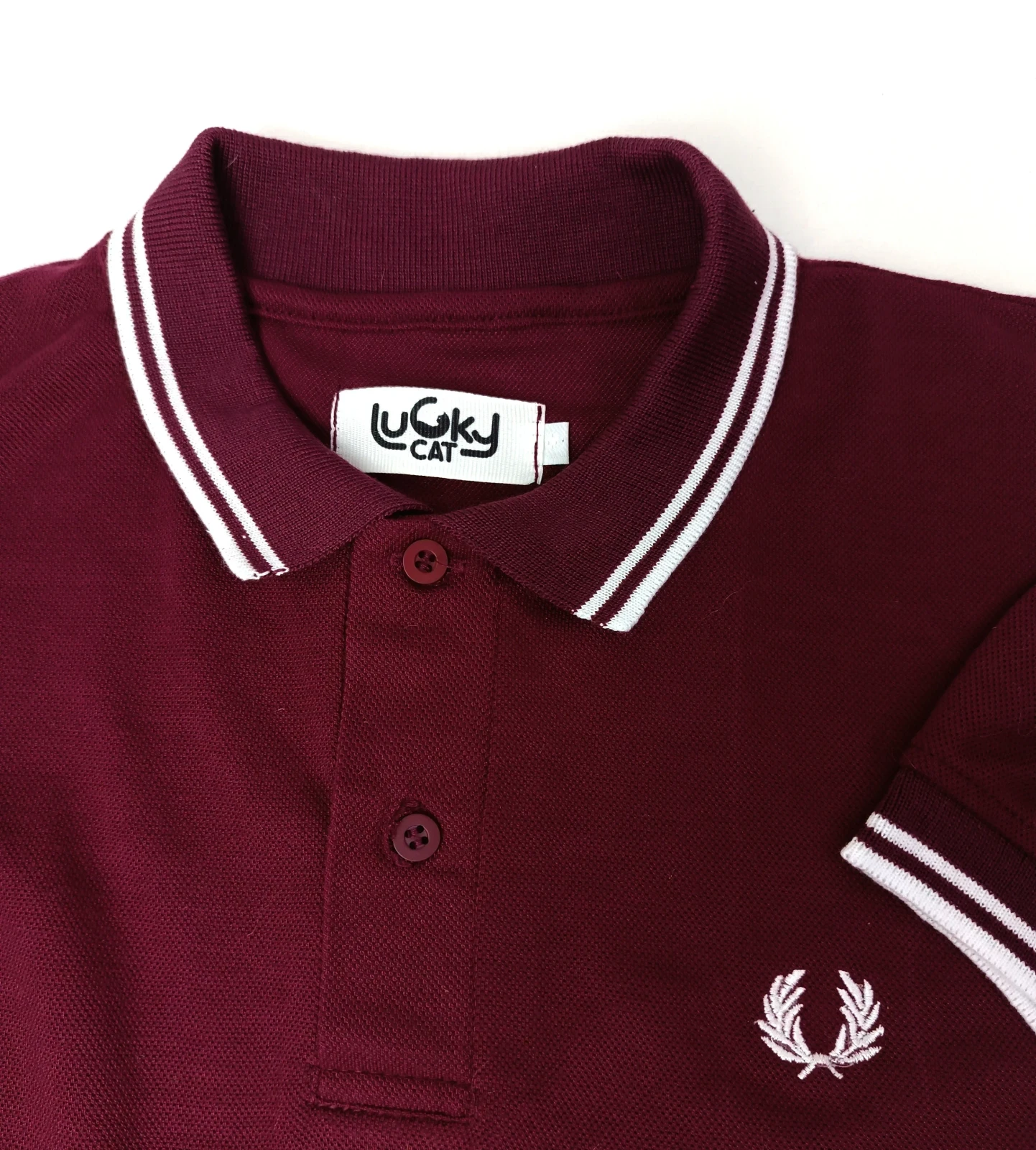 Camisa polo vinotinto con blanco