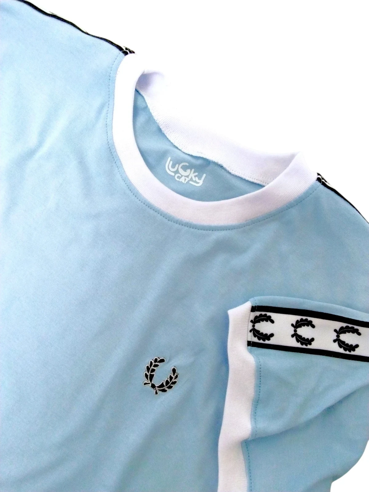Camiseta cinta laureles azul claro 