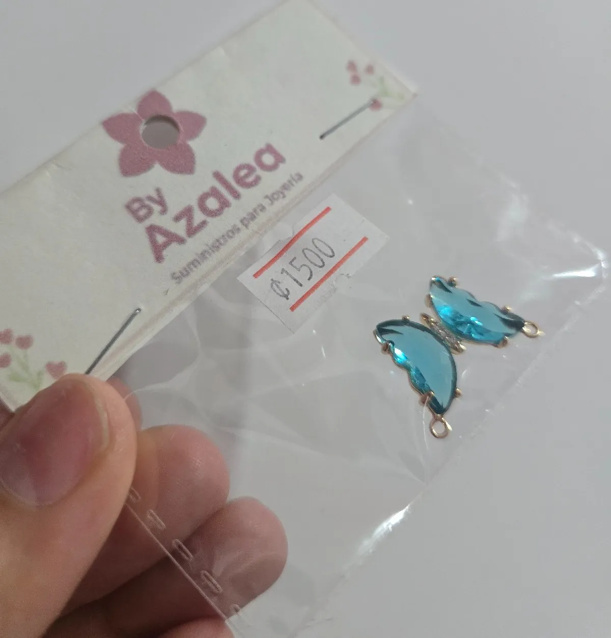 Dije mariposa Celeste