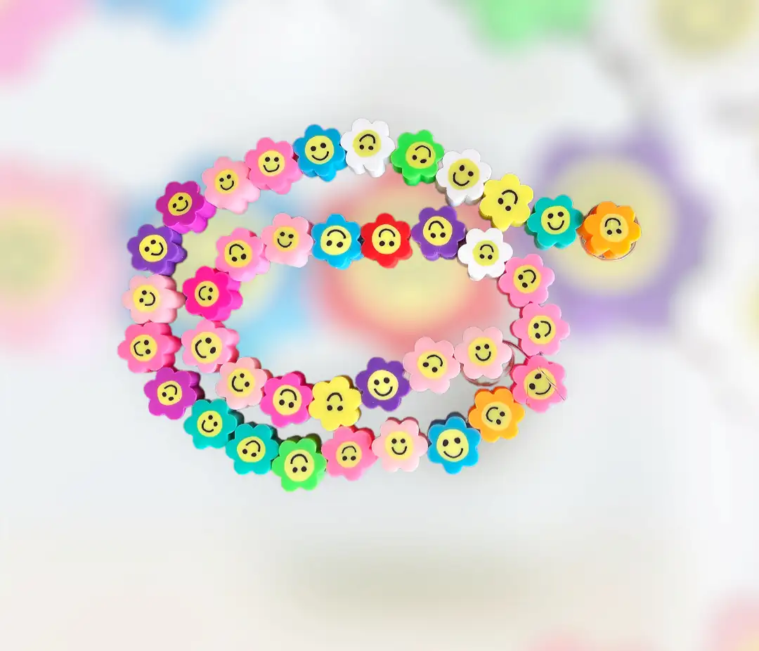 Fimo de flores con caritas multi