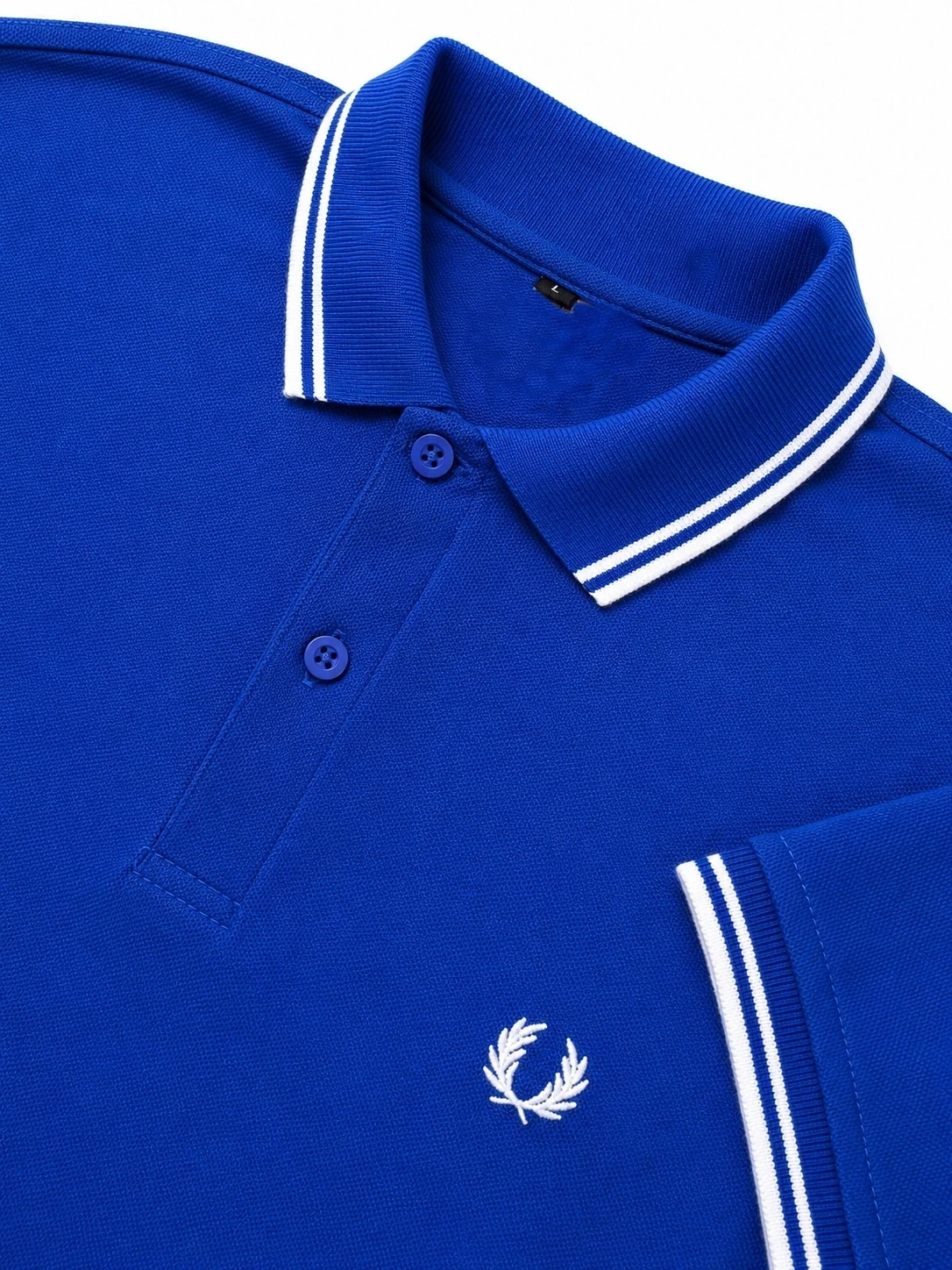 Camisa polo azul rey con blanco 