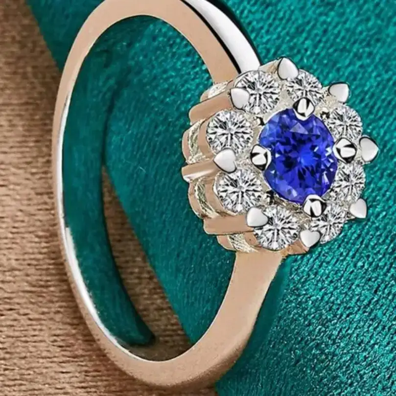 Anillo de flor con zirconia azul plata ley 925  2