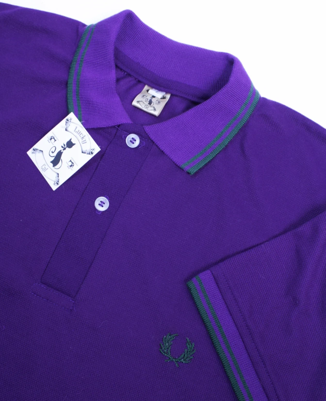 Camisa polo morada talla L 