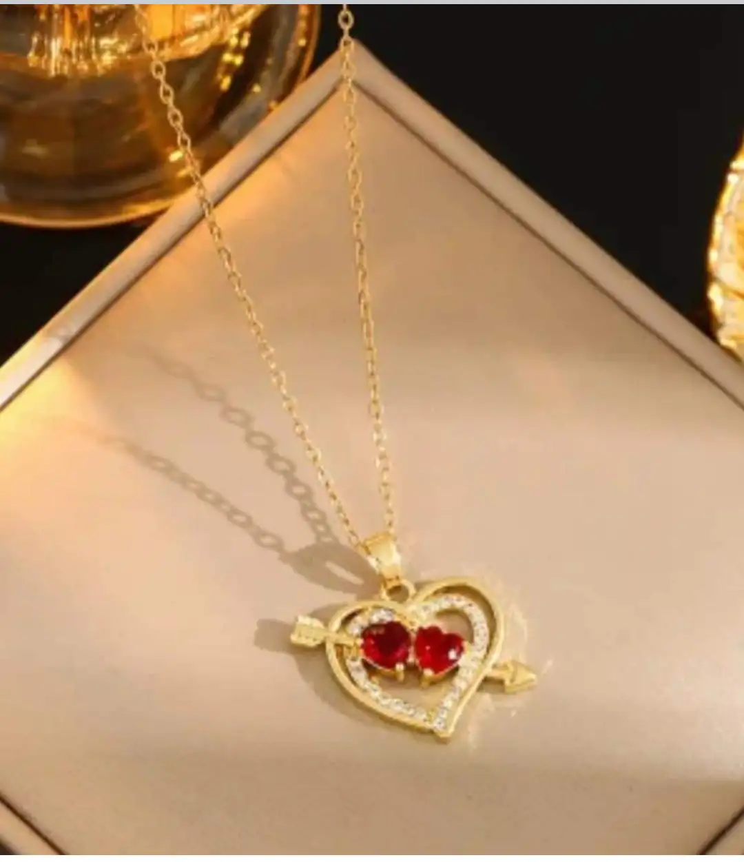 Collar de corazon cupido