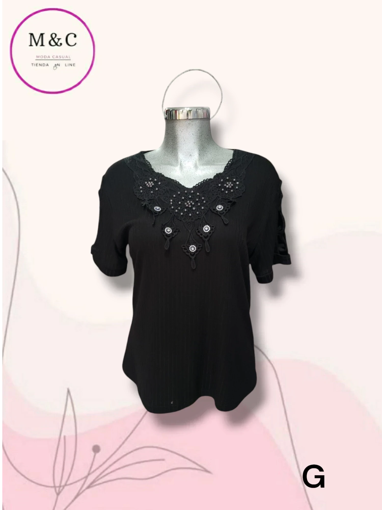 Blusa manga corta con aplicación
