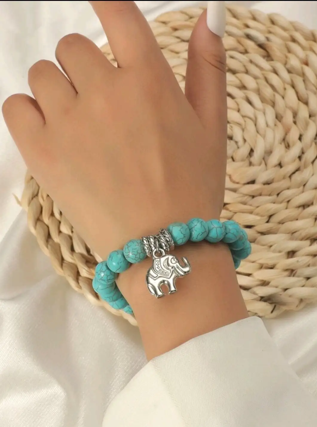 Pulsera turqueza con elefante plateado