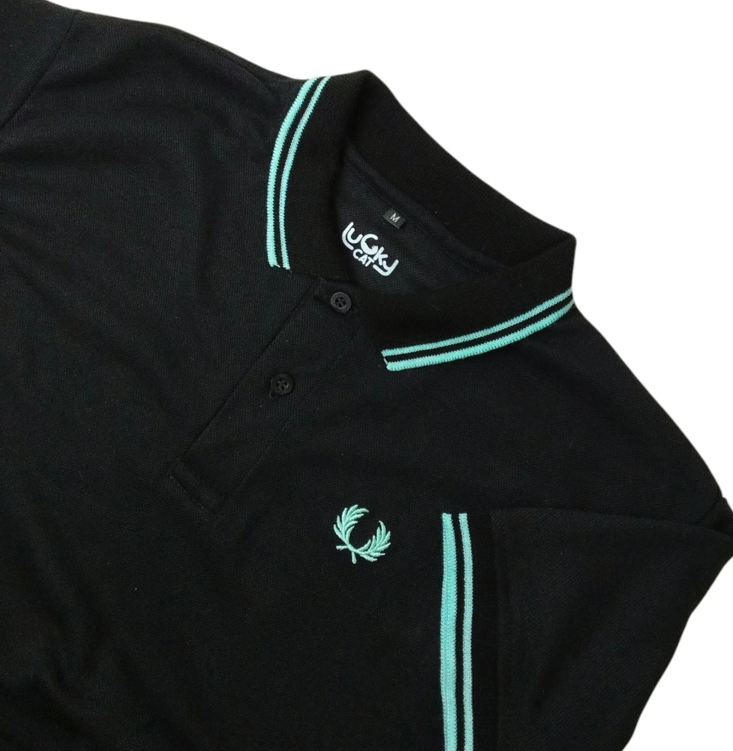 Camisa polo negra con verde menta 