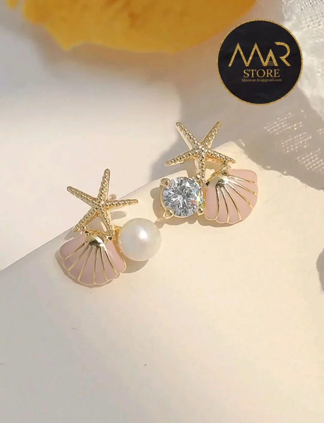 Bellos pendientes en aleación e imitación de perla 