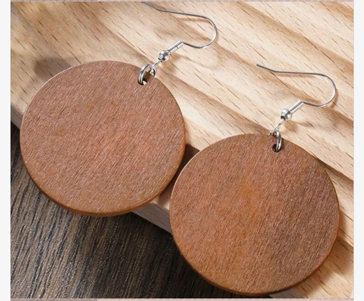 Pendientes con diseño circular en tono café 