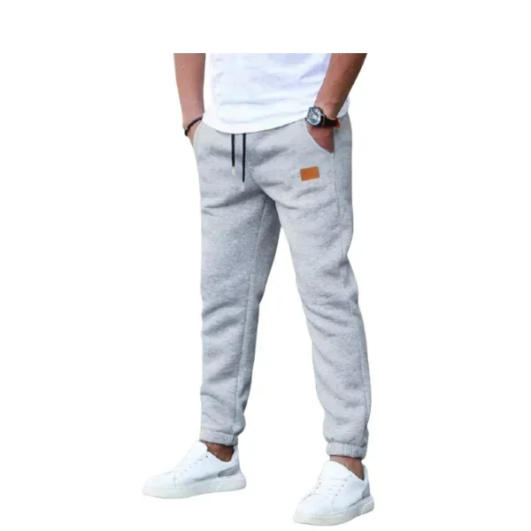 Pantalones deportivos con bolsillo oblicuo