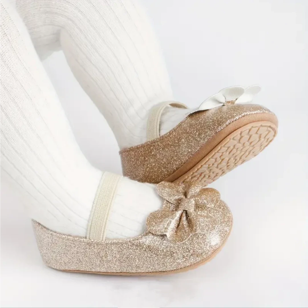 ZAPATITOS ORO CON LAZO 