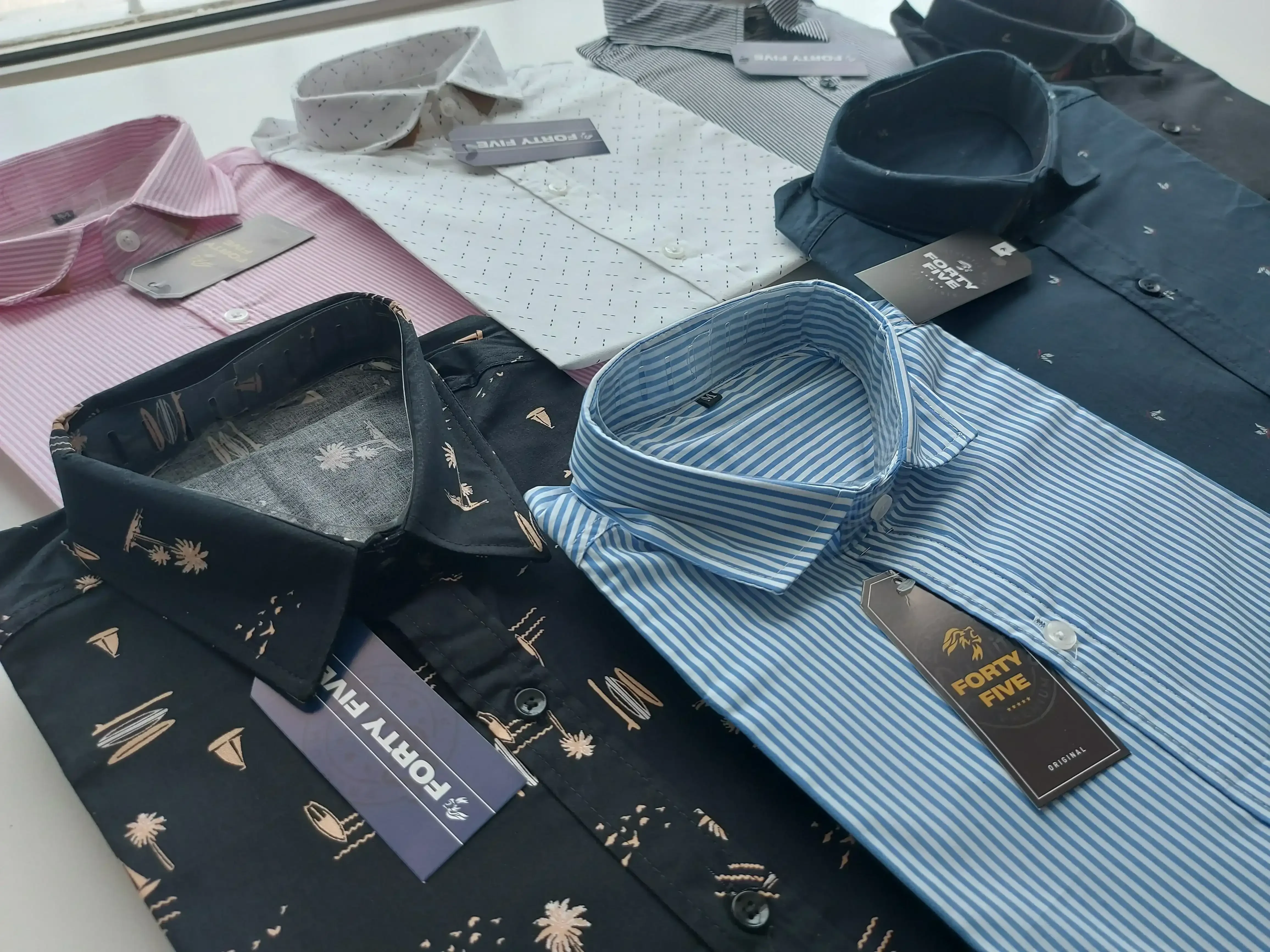 CAMISAS ENTALLADAS