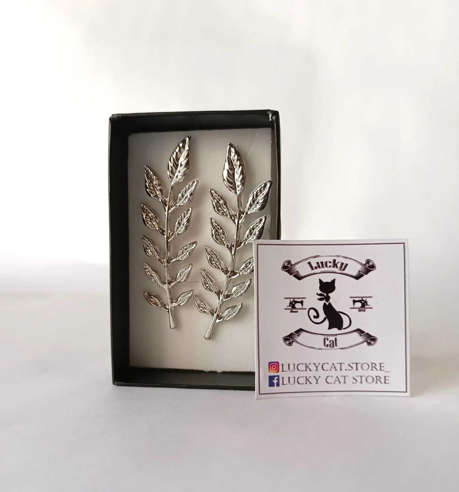 Pins en forma de laurel 