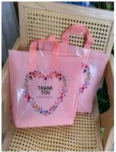 Bolsa rosa de asa