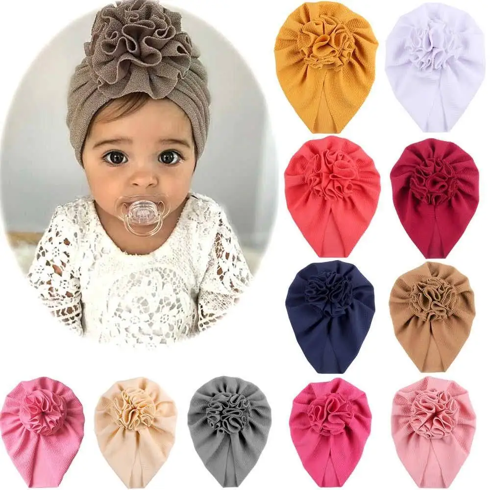 Turbante flor de la misma tela 