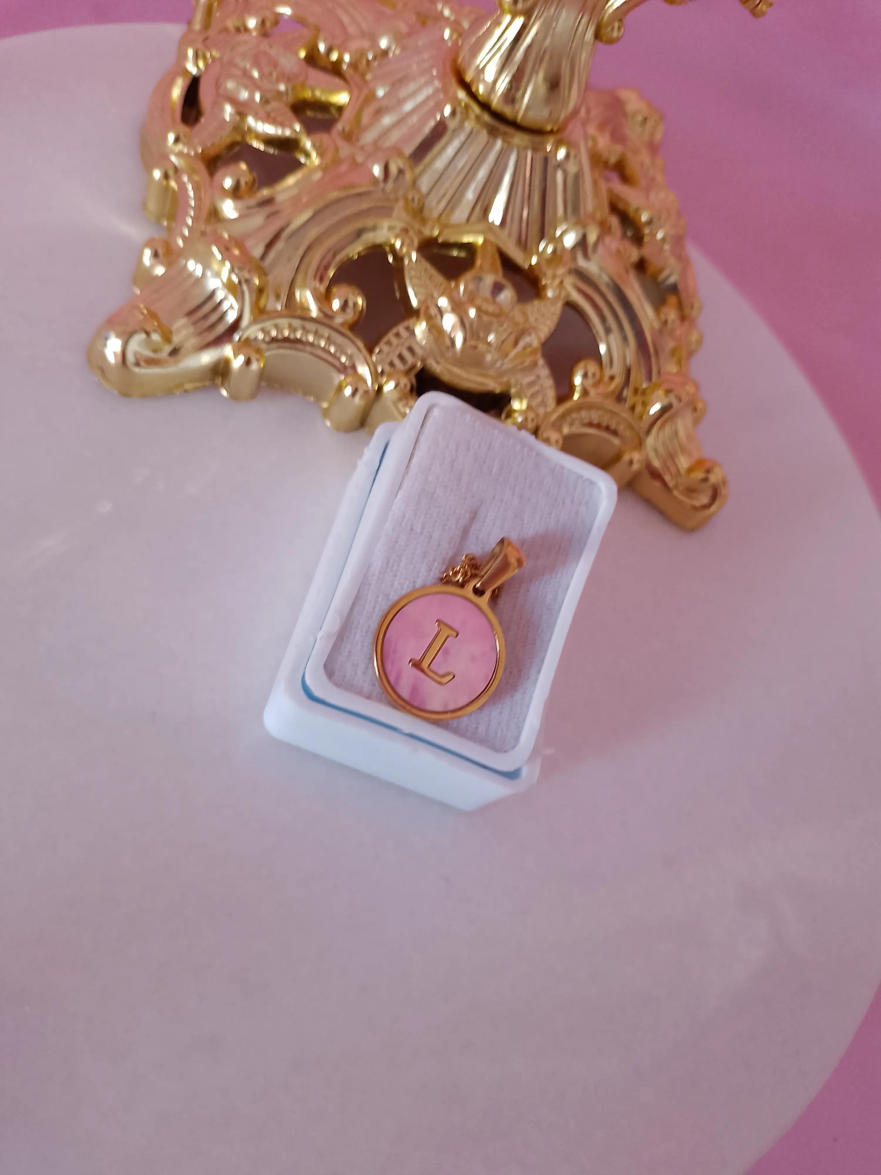 Inicial redonda rosa 