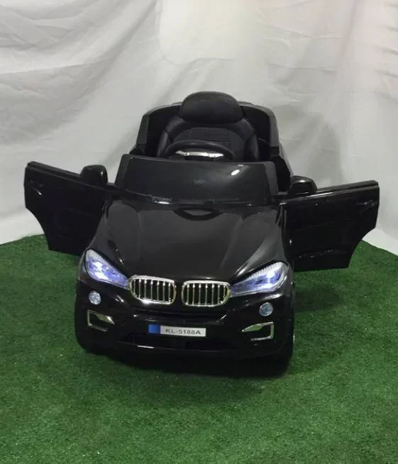 Carro eléctrico recargable para niños BMW con luces en las llantas de 1 a 6 años 5