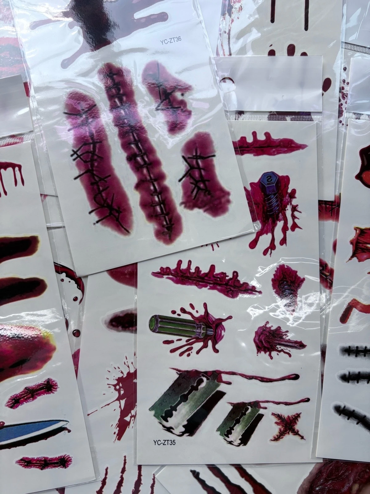 DOCENA DE TATUAJES TEMPORALES DE HERIDAS Y CICATRICES