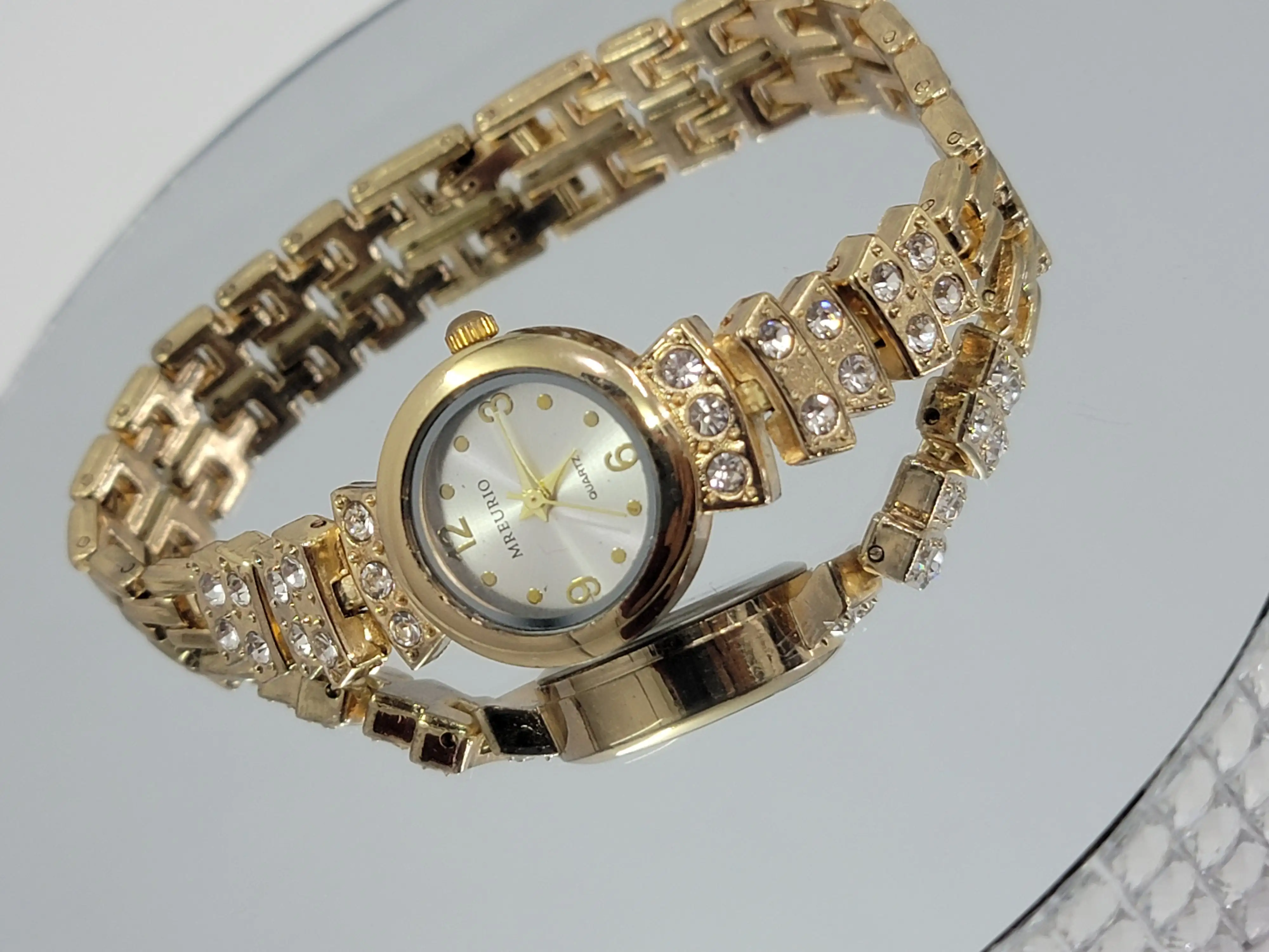 Reloj acerado dorado 2