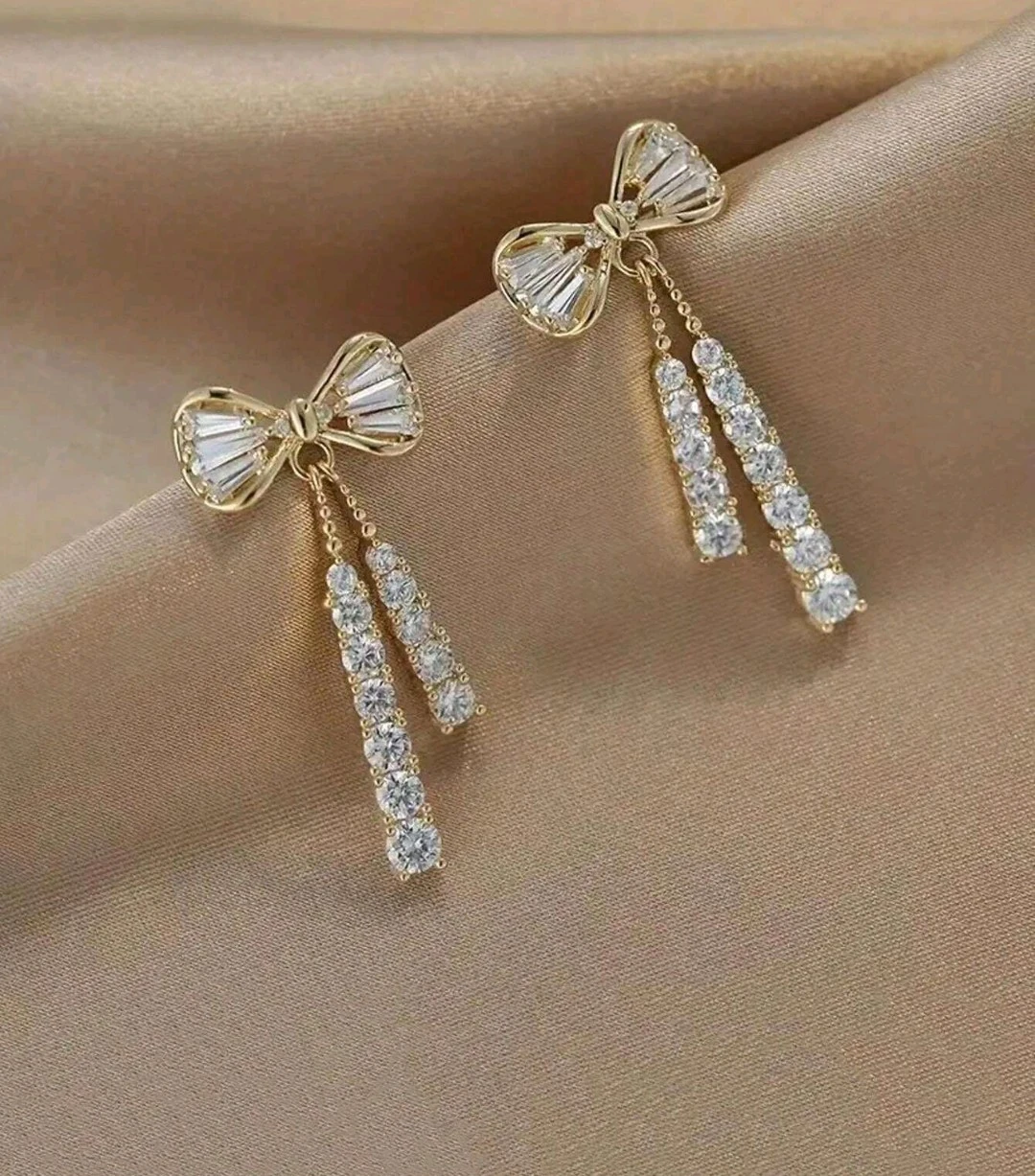 Aretes colgantes moño  4
