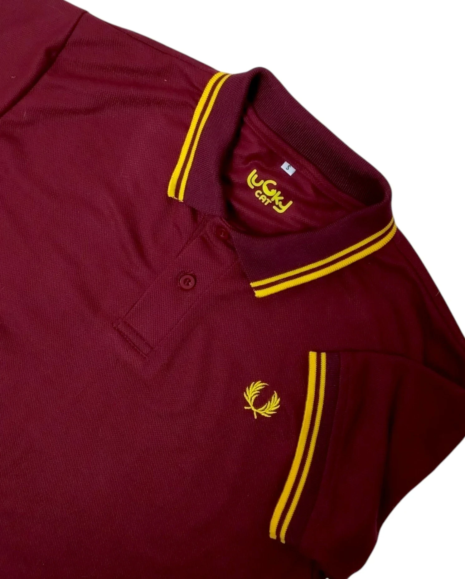 Camisa polo vinotinto con amarillo 