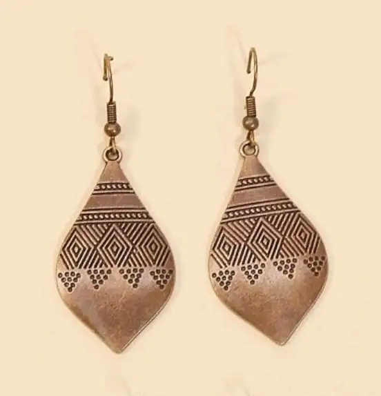 Par de aretes rusticos color cobre