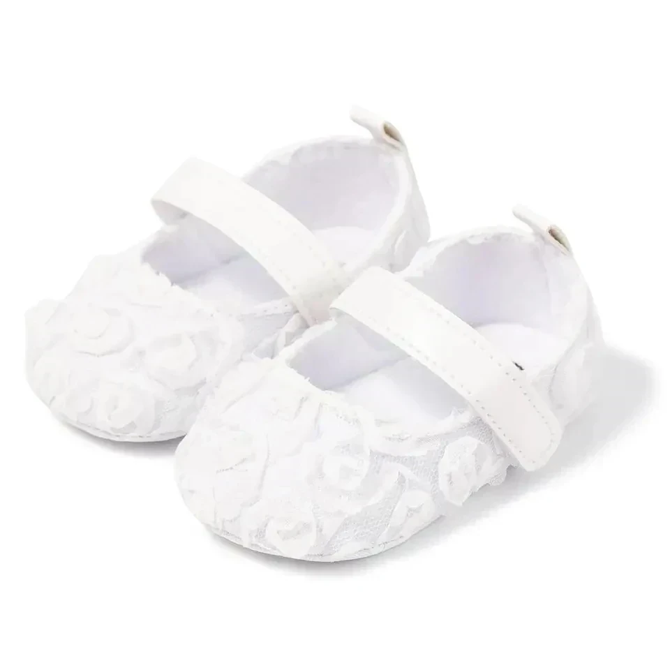 ZAPATITOS BLANCOS FLORES