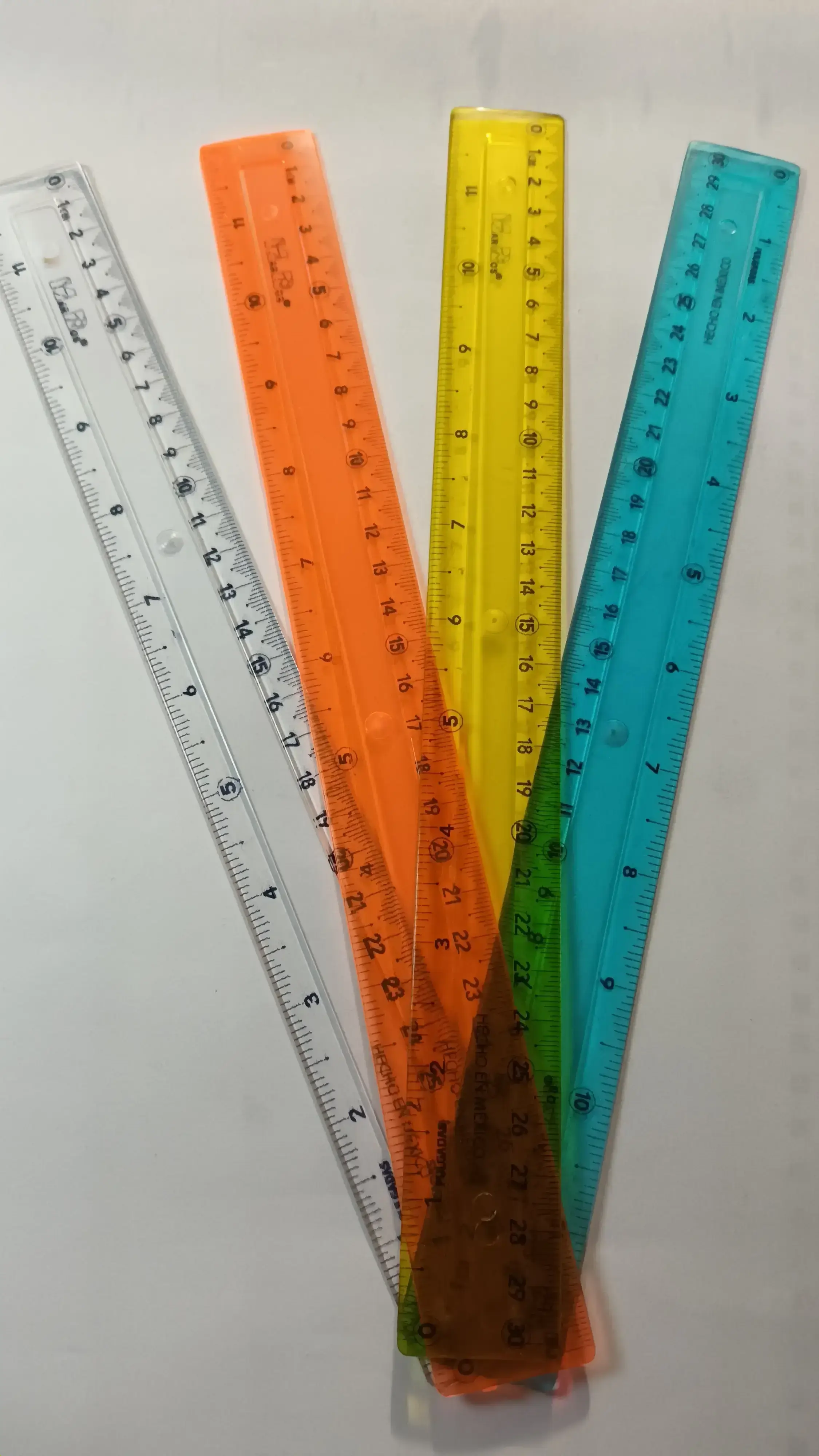REGLA DE PLASTICO MARROS 30 CM 2