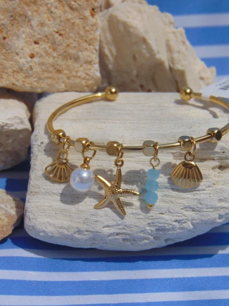 PULSERA ACERO ARO DOR DIJES ESTRELLA CONCHAS