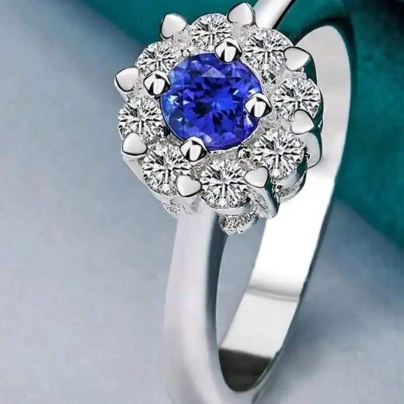 Anillo de flor con zirconia azul plata ley 925 