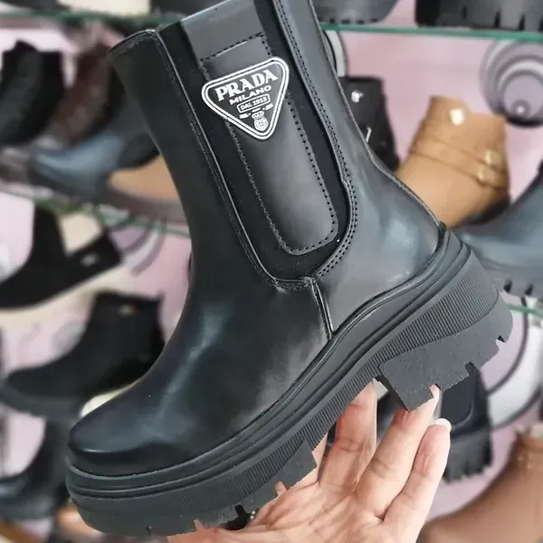Dama botas y botines planos