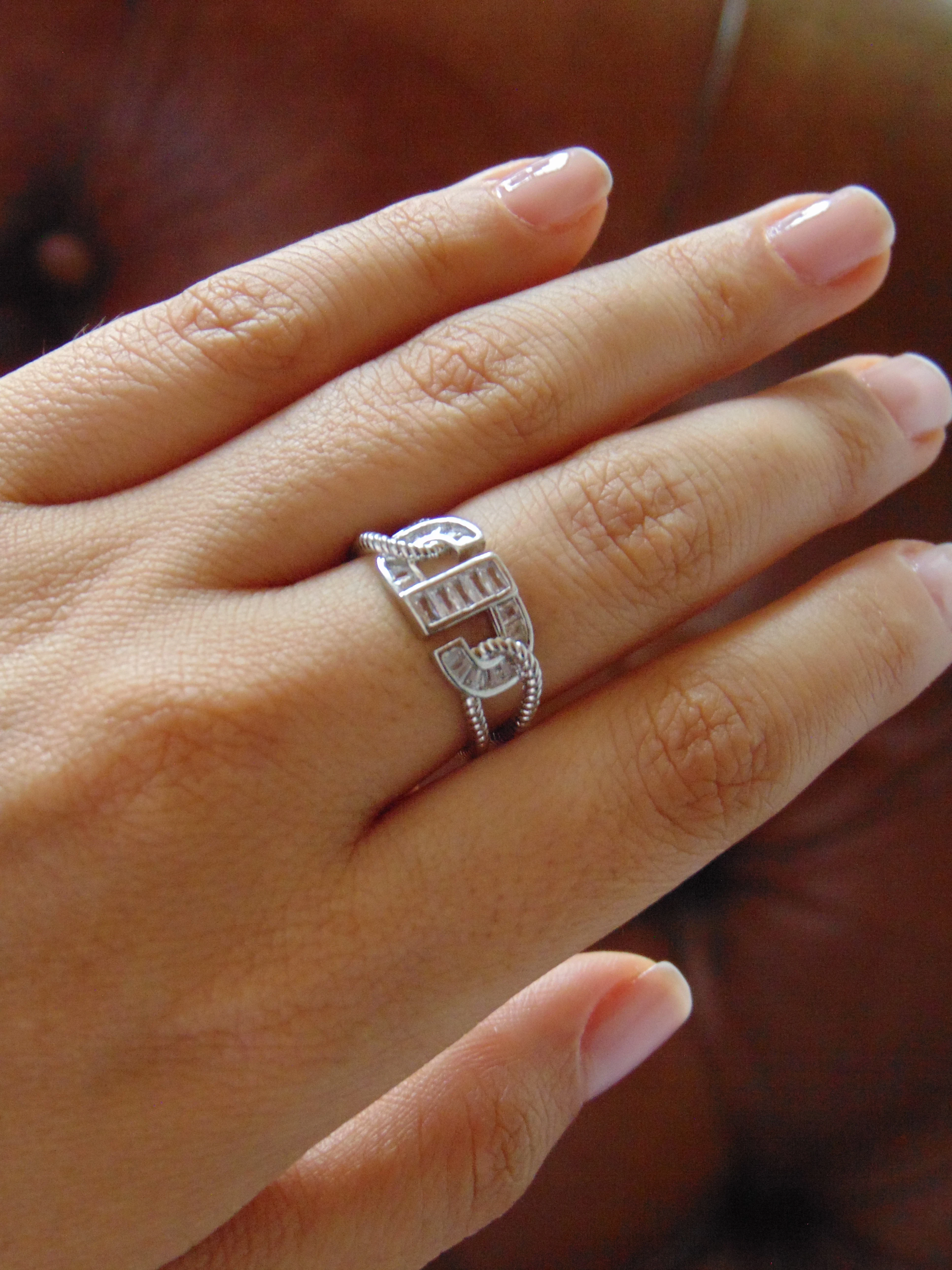 ANILLO ACERO PLATE ENTRELAZADO BAGUET