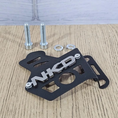 Akt Nkd 125 protector de mordaza acero color negro logo 3d cromado ML