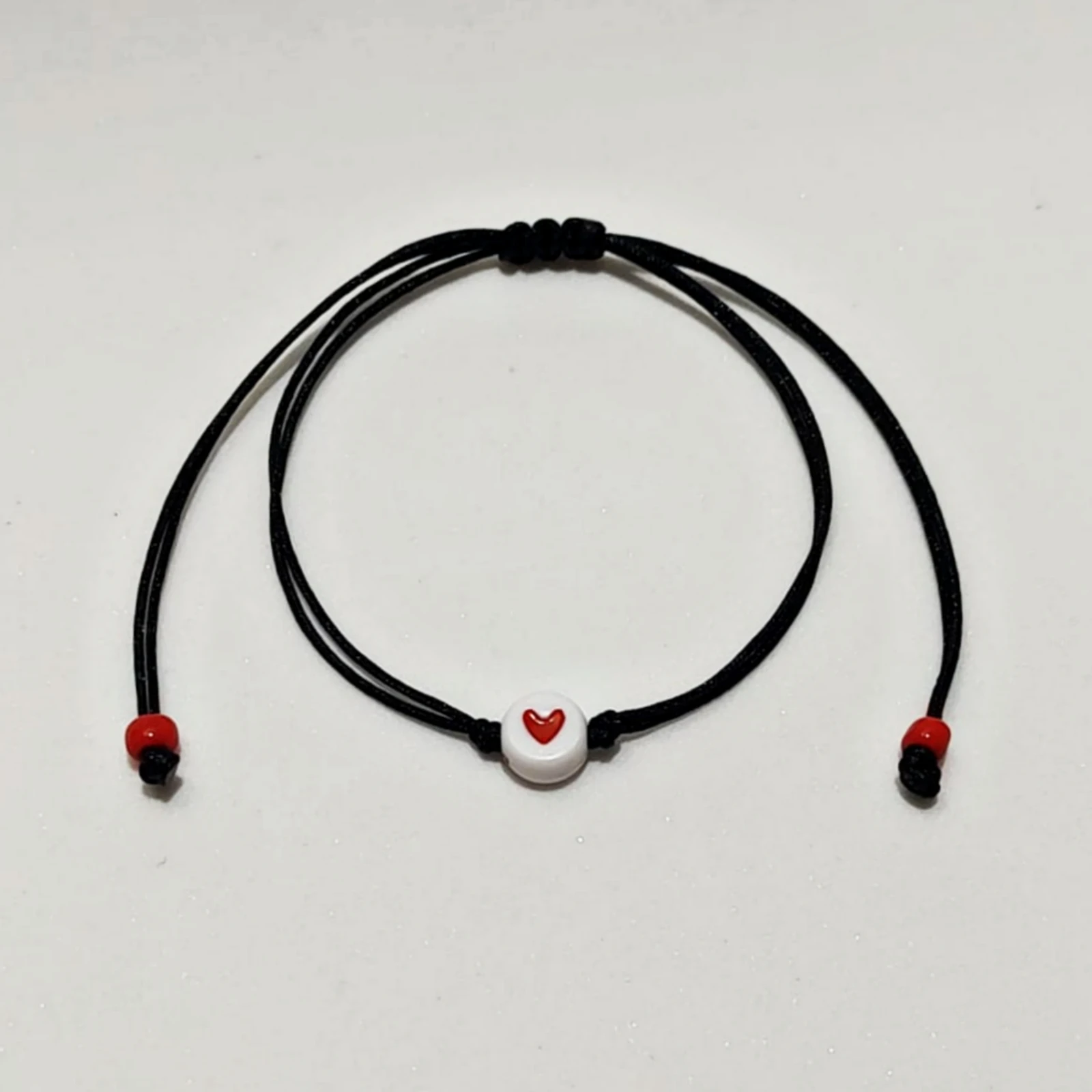 Pulsera Negra con  Corazón 2