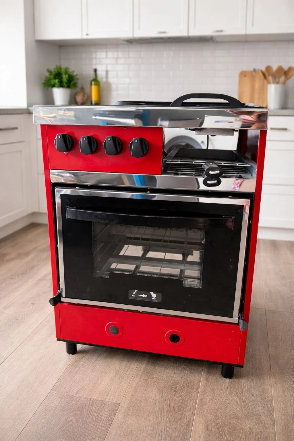COCINA DELU 2 HORNALLAS C/PLANCHETA Y CARLITERO 60CM GAS ENVASADO