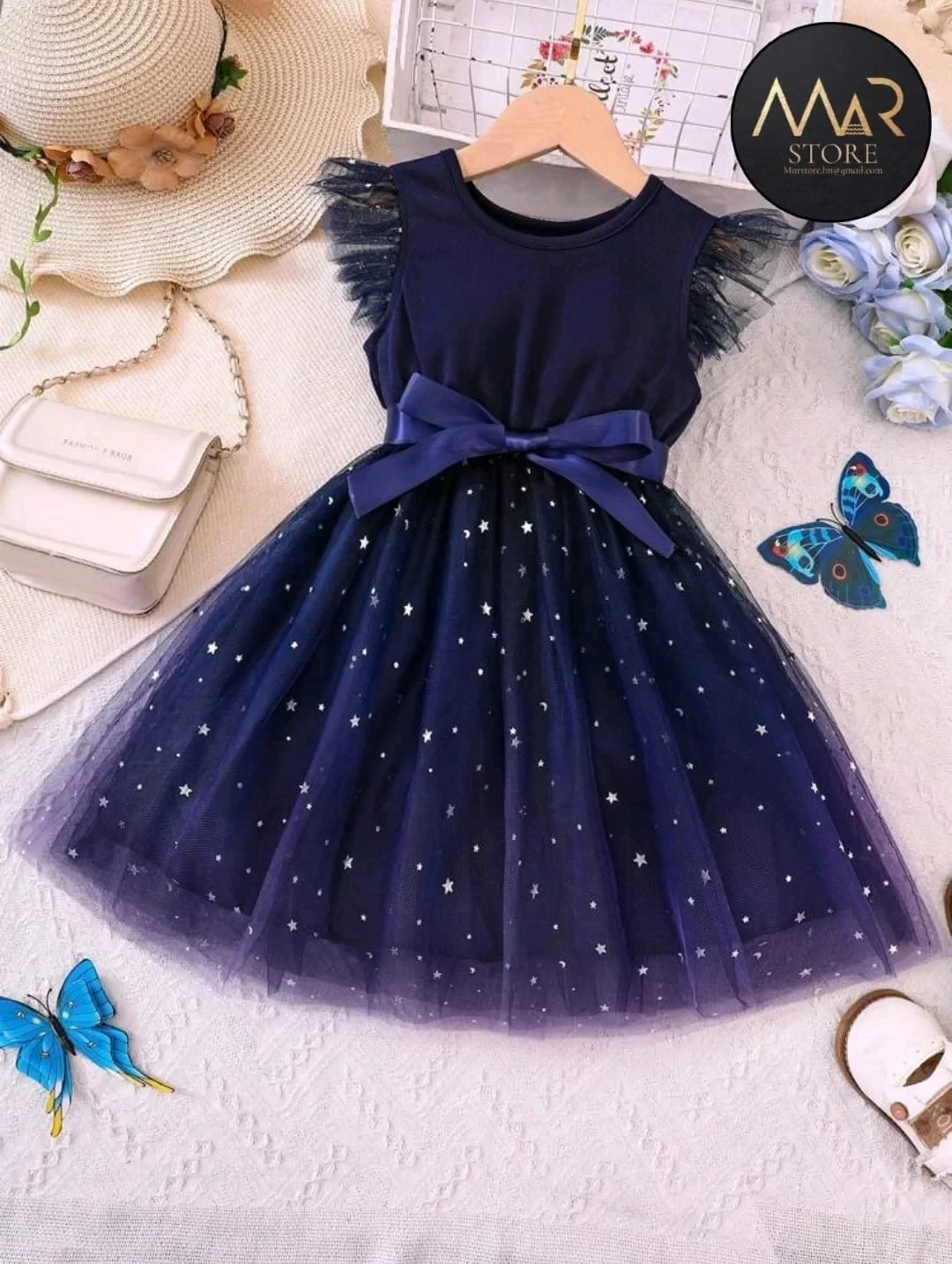 Vestido encantador de manga de hada en malla color azul marino
