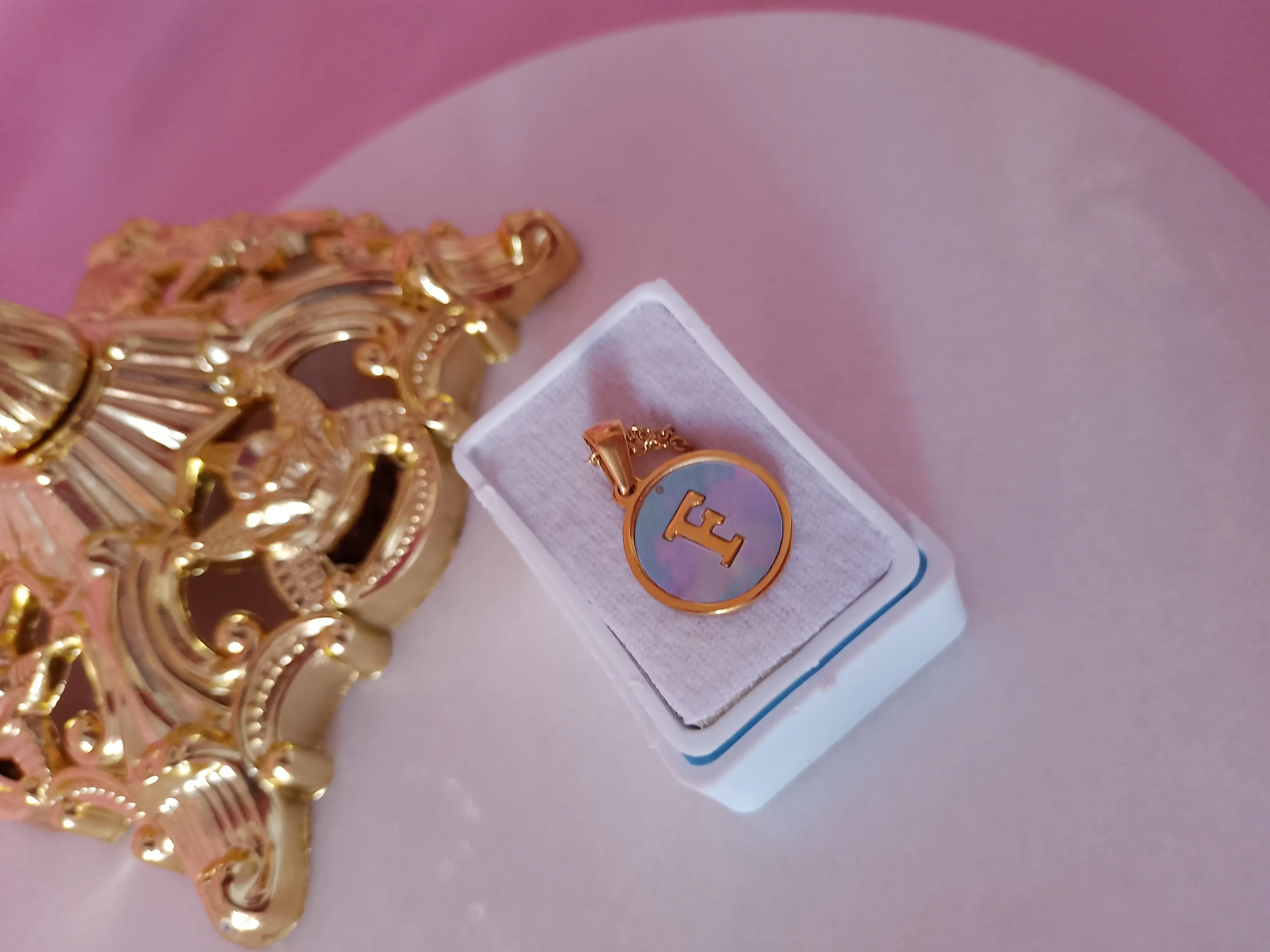 Inicial redonda azul 