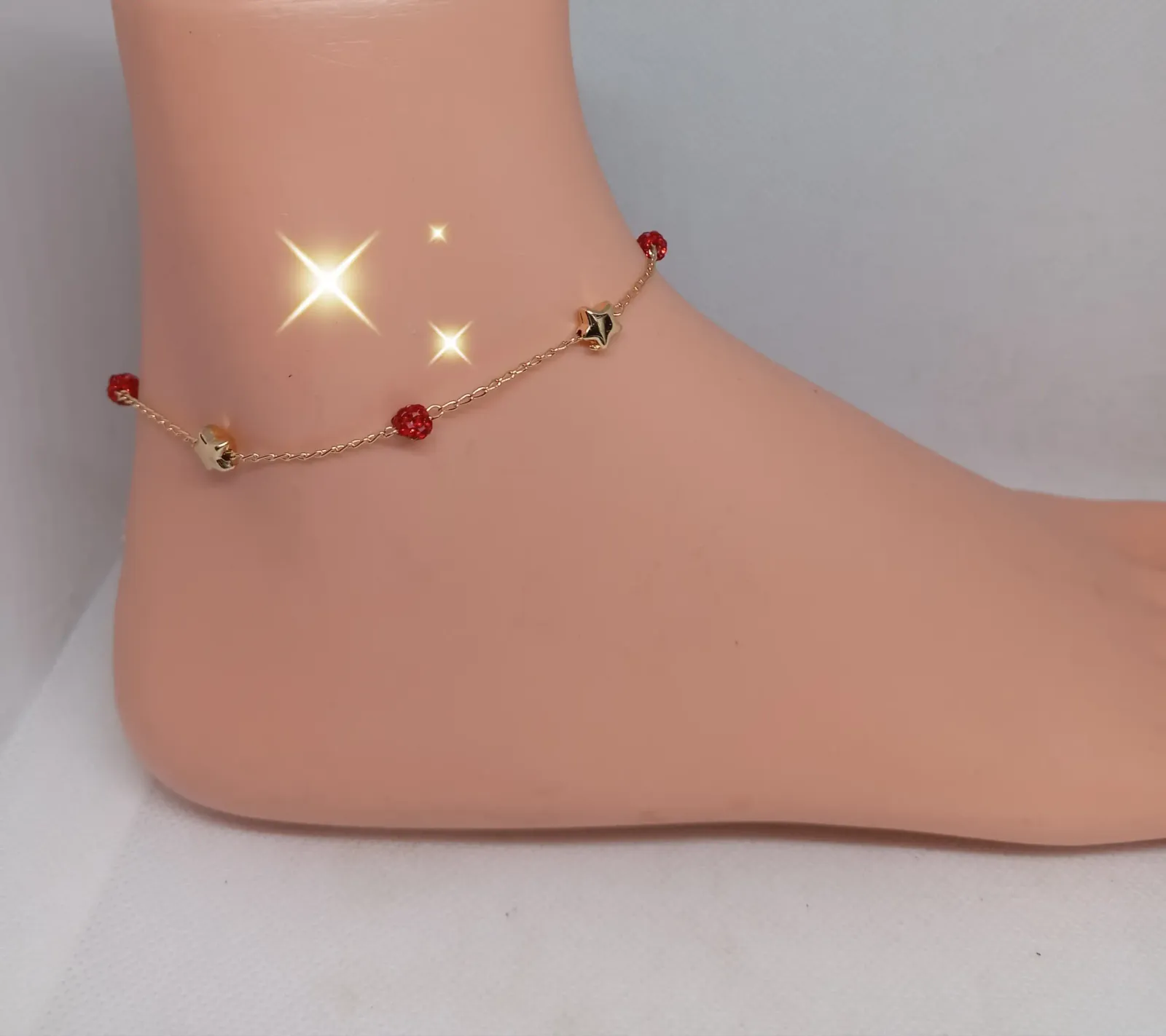 Tobillera piedritas rojas 