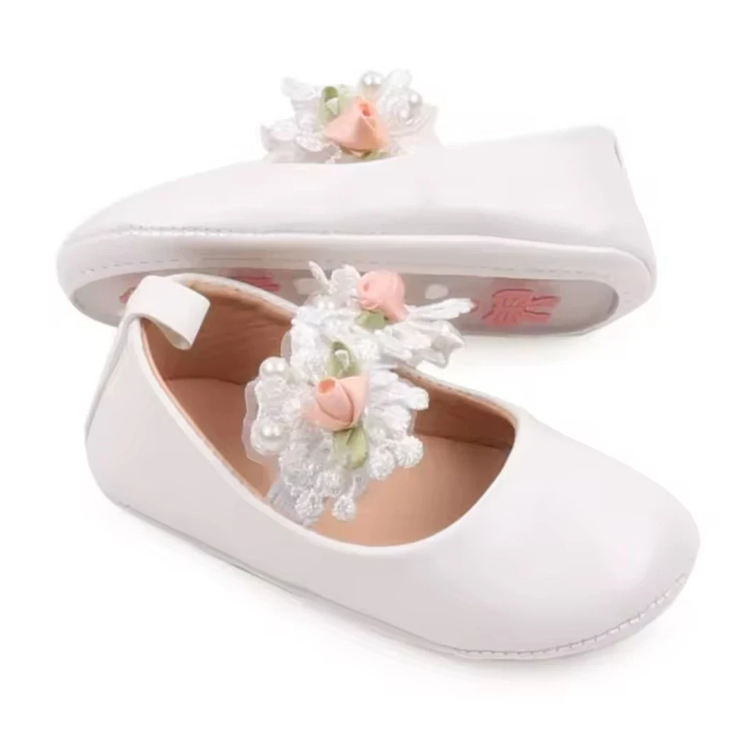 ZAPATITOS BLANCOS FLORES 3