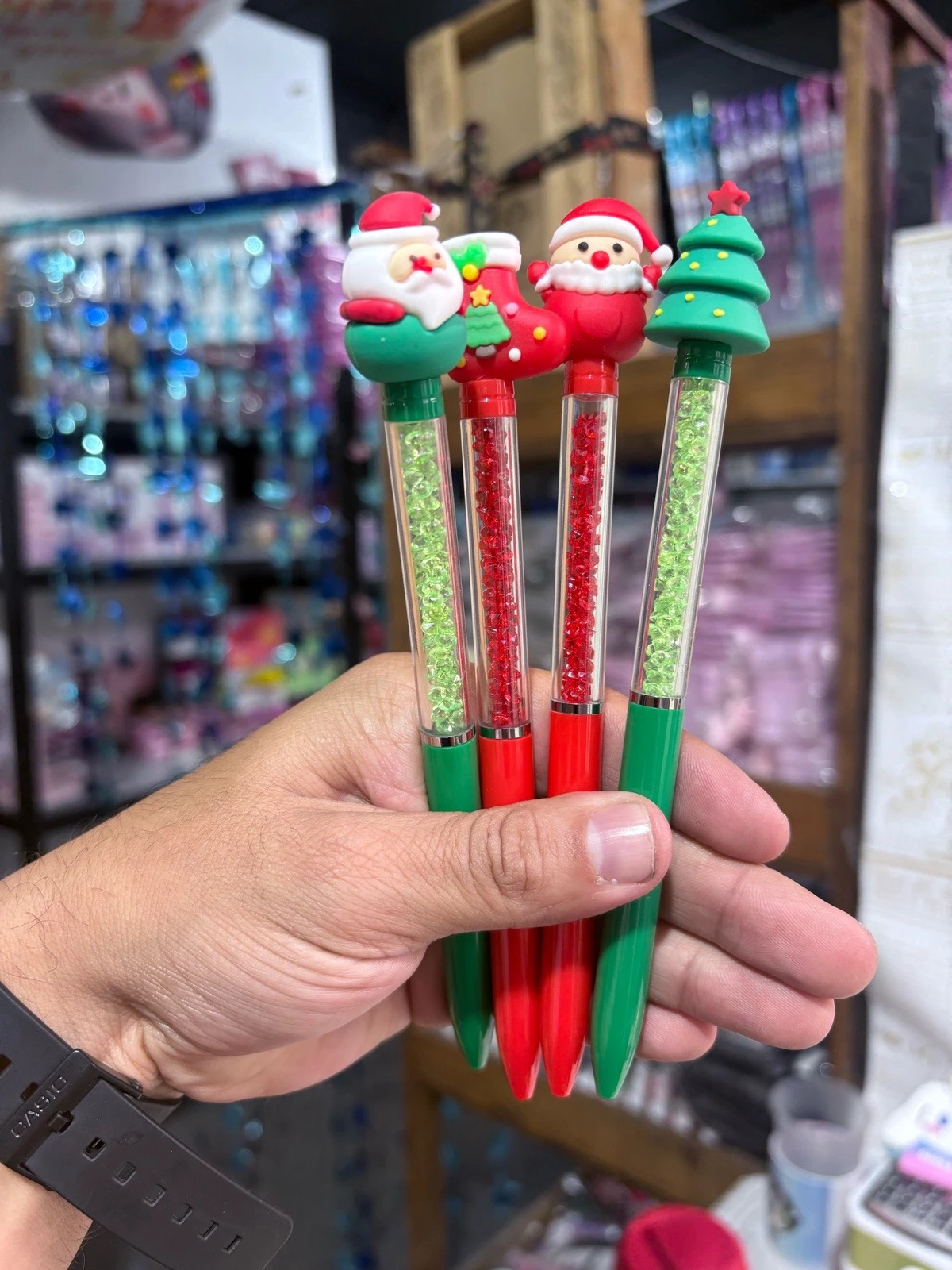 Docena de Plumas Navideñas Con Brillos Y Figuras 3D De Silicona 7